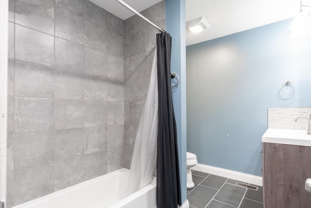 full bathroom featuring shower / bath combination with curtain, vanity, tile patterned floors, and toilet