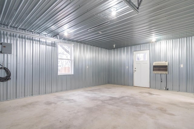 garage featuring heating unit