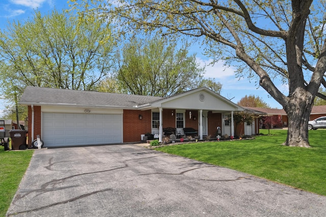ranch-style home featuring a front lawn, aphalt driveway, a porch, a garage, and brick siding