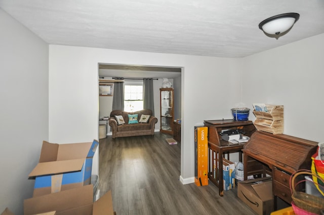 office area featuring wood finished floors and baseboards