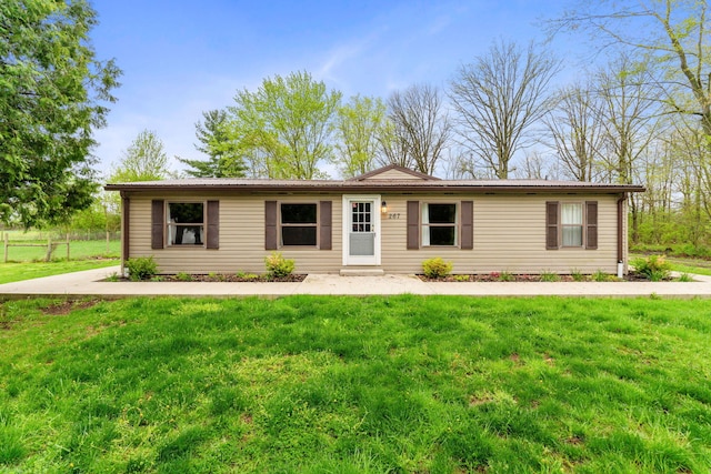 view of front of home with a front yard
