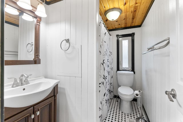 bathroom with tile patterned flooring, wooden ceiling, vanity, toilet, and a shower with shower curtain