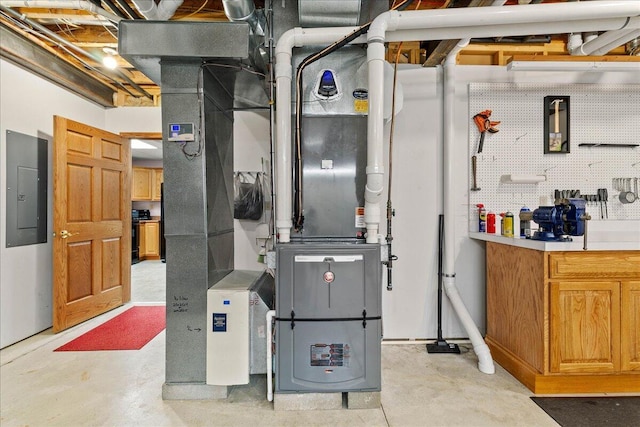 utility room featuring electric panel