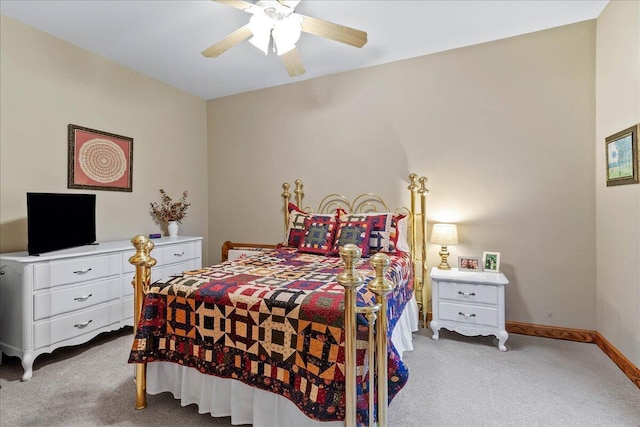 bedroom featuring carpet floors, ceiling fan, and baseboards