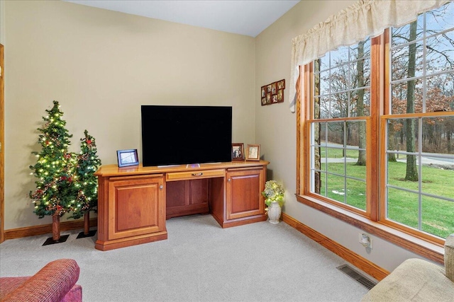 office with visible vents, light carpet, and baseboards