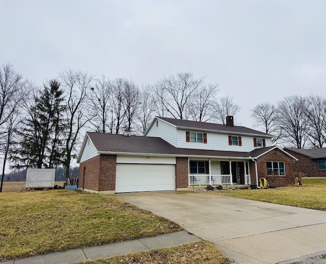 front of property featuring a porch, a garage, and a front yard