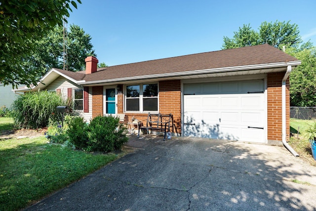 413 Weinland St, New Carlisle, OH 45344 - single story home featuring driveway, brick siding, a chimney, a garage, and a shingled roof