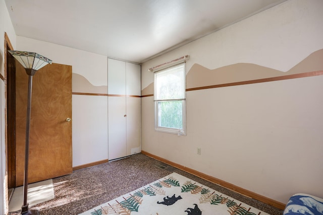 413 Weinland St, New Carlisle, OH 45344 - unfurnished bedroom featuring baseboards and a closet