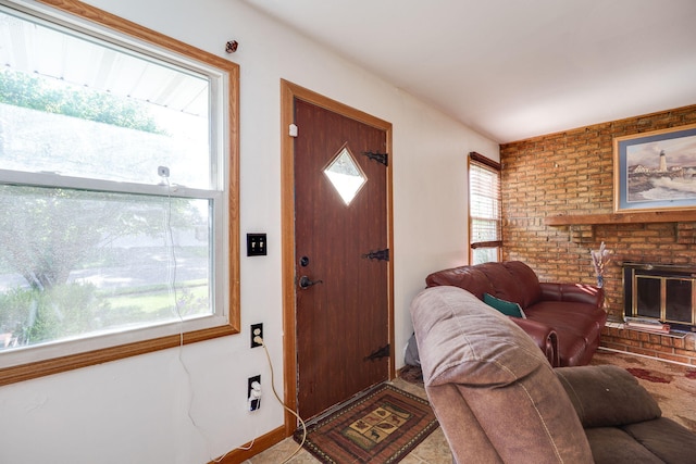 413 Weinland St, New Carlisle, OH 45344 - foyer entrance featuring a brick fireplace