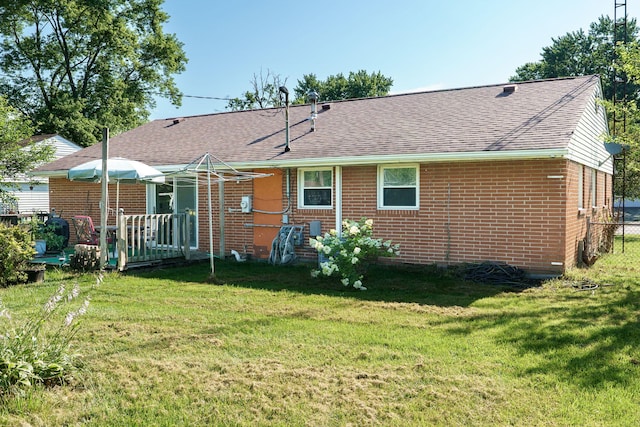 413 Weinland St, New Carlisle, OH 45344 - back of house featuring brick siding and a shingled roof