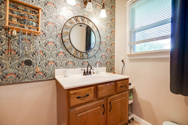 413 Weinland St, New Carlisle, OH 45344 - bathroom with wallpapered walls and vanity