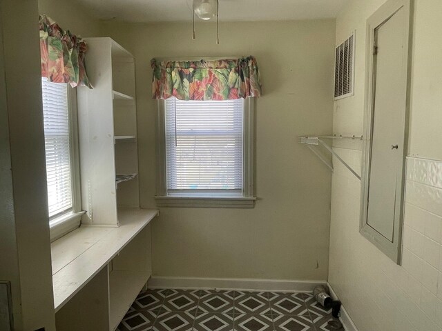 interior space with visible vents and baseboards