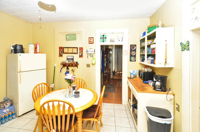 dining room featuring light tile patterned floors