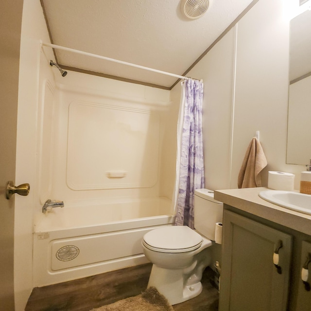 11524 Powhattan Path, Lakeview, OH 43331 - full bath with shower / bath combo with shower curtain, toilet, vanity, and wood finished floors
