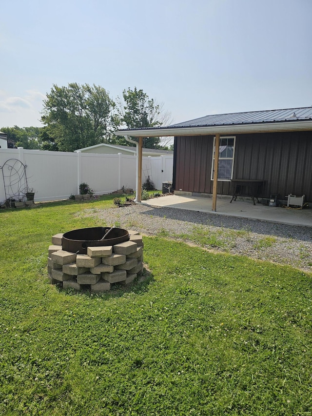 11524 Powhattan Path, Lakeview, OH 43331 - view of yard with an outdoor fire pit and a patio area