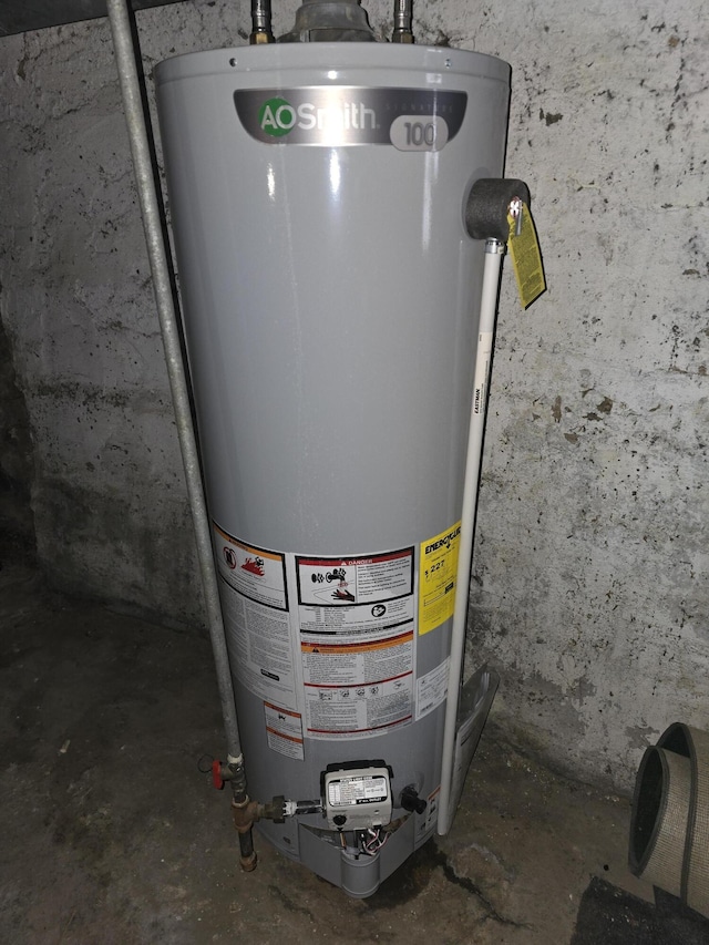 utility room with water heater