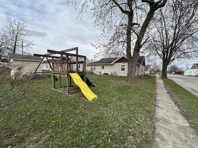 view of playground featuring a yard