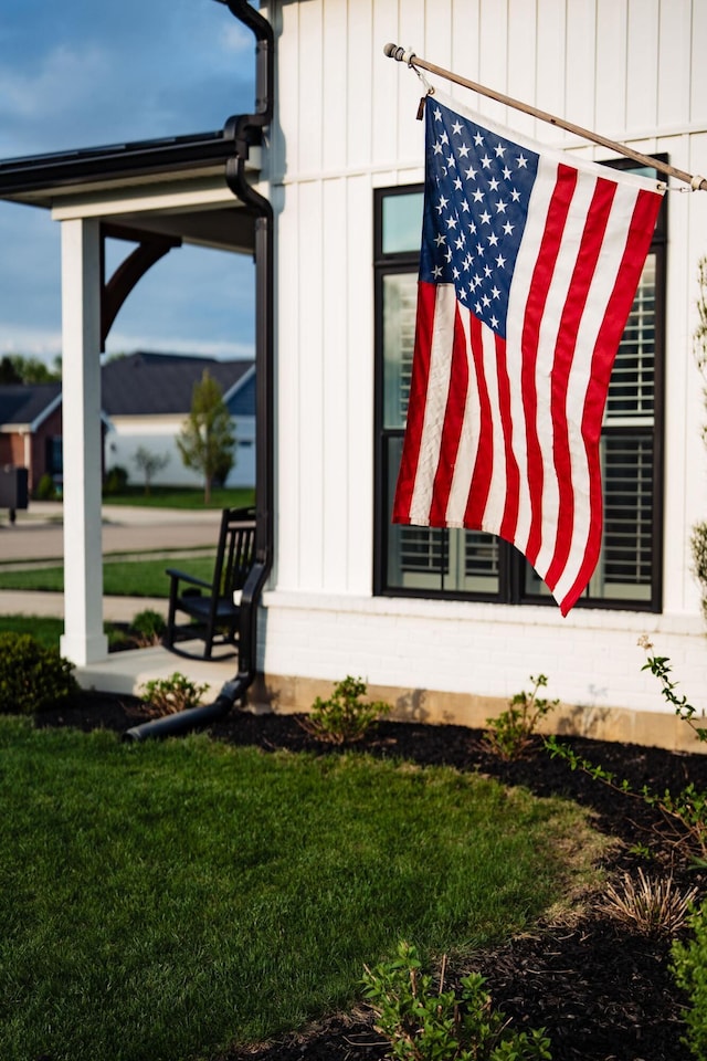 2737 Executive Dr, Troy, OH 45373 - view of home's exterior featuring a lawn