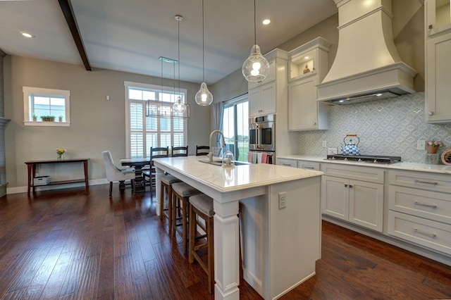 2737 Executive Dr, Troy, OH 45373 - kitchen featuring premium range hood, a sink, appliances with stainless steel finishes, dark wood finished floors, and recessed lighting