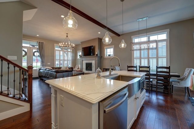 2737 Executive Dr, Troy, OH 45373 - kitchen featuring dishwasher, healthy amount of natural light, dark wood finished floors, a sink, and recessed lighting