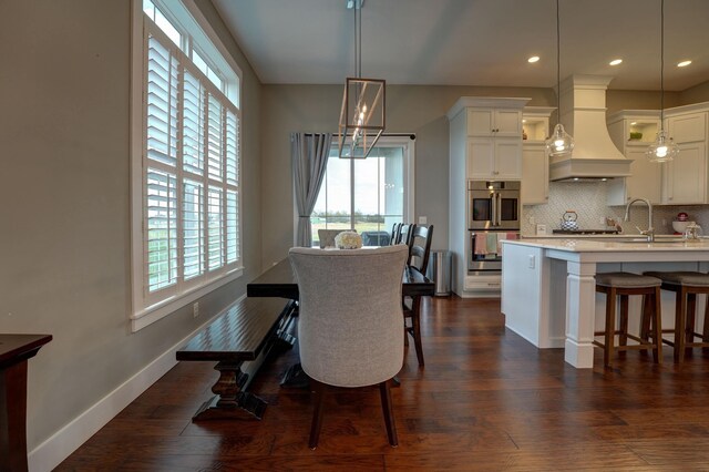 2737 Executive Dr, Troy, OH 45373 - dining room featuring healthy amount of natural light, dark wood finished floors, recessed lighting, and baseboards