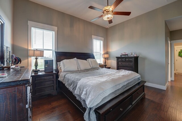 2737 Executive Dr, Troy, OH 45373 - bedroom featuring dark wood-type flooring, baseboards, and ceiling fan