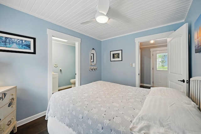14506 Maple Ave, Lakeview, OH 43331 - bedroom featuring baseboards, dark wood finished floors, ensuite bath, and a ceiling fan