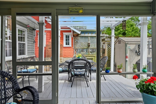 14506 Maple Ave, Lakeview, OH 43331 - sunroom featuring outdoor dining space