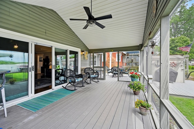 14506 Maple Ave, Lakeview, OH 43331 - sunroom with vaulted ceiling, a ceiling fan, and outdoor dining space