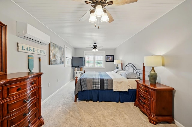 14506 Maple Ave, Lakeview, OH 43331 - bedroom featuring a wall mounted AC, carpet floors, baseboards, and ceiling fan