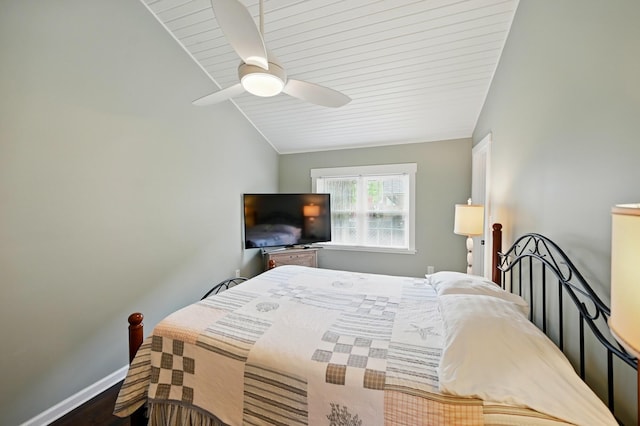 14506 Maple Ave, Lakeview, OH 43331 - bedroom featuring vaulted ceiling, baseboards, dark wood finished floors, and ceiling fan