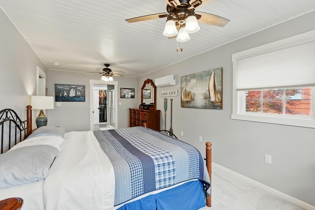 14506 Maple Ave, Lakeview, OH 43331 - bedroom featuring carpet, a wall unit AC, a walk in closet, ceiling fan, and baseboards