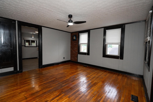 317 S Miami Ave, Xenia, OH 45385 - unfurnished room with ceiling fan, hardwood / wood-style flooring, a textured ceiling, and baseboards