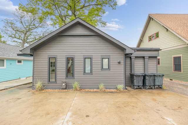 7925 Hickory Ave, Russells Point, OH 43348 - back of property with a patio and a jacuzzi