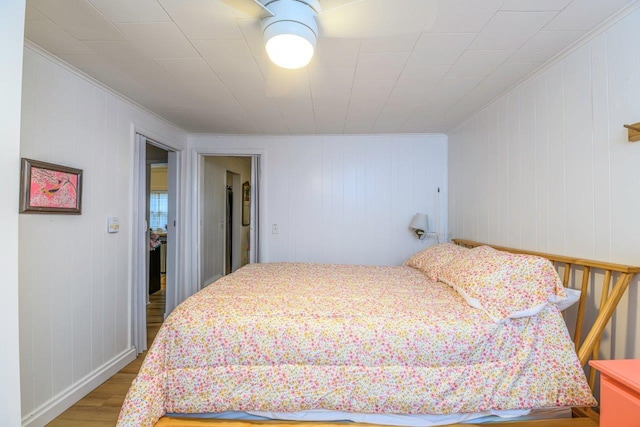 9887 Forest St, Lakeview, OH 43331 - bedroom with wood finished floors and crown molding