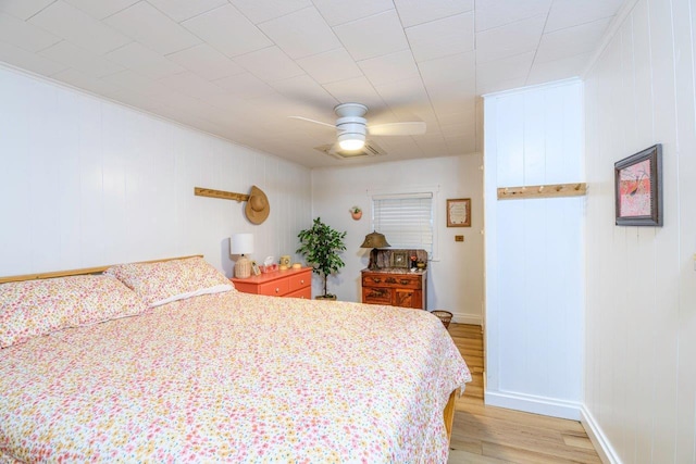 9887 Forest St, Lakeview, OH 43331 - bedroom featuring light wood-style floors, crown molding, baseboards, and ceiling fan