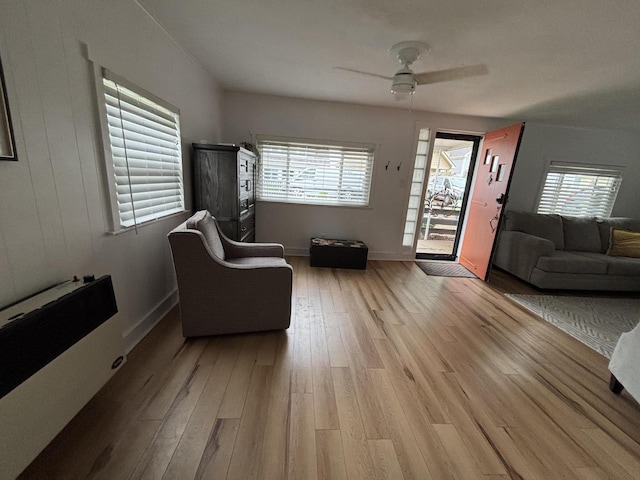 9887 Forest St, Lakeview, OH 43331 - sitting room featuring light wood-type flooring, ceiling fan, and baseboards