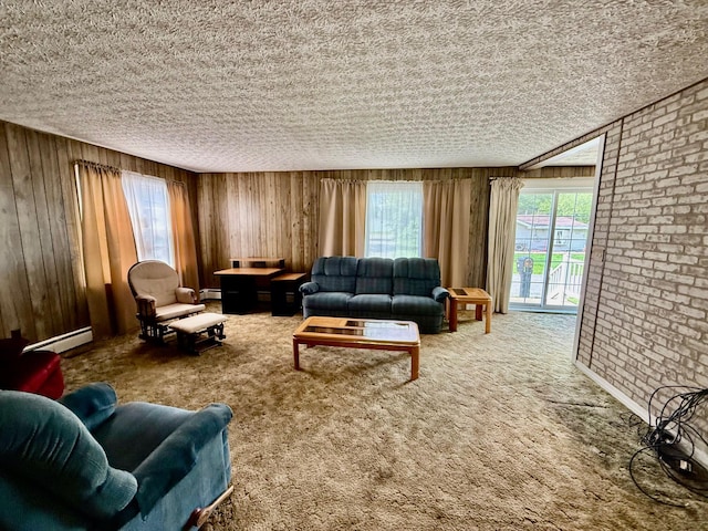 7188 Clark Dr, Russells Point, OH 43348 - living room featuring a baseboard heating unit, healthy amount of natural light, carpet, wooden walls, and a textured ceiling