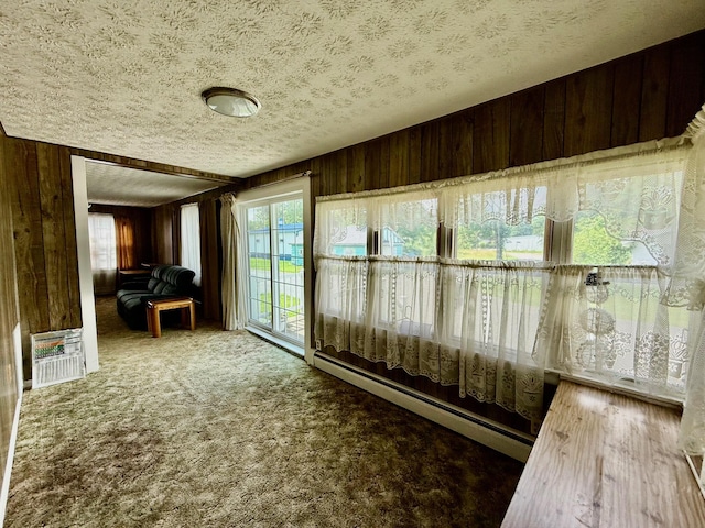 7188 Clark Dr, Russells Point, OH 43348 - sunroom / solarium featuring a baseboard radiator