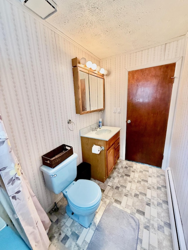 7188 Clark Dr, Russells Point, OH 43348 - bathroom with baseboard heating, tile patterned floors, vanity, and a textured ceiling