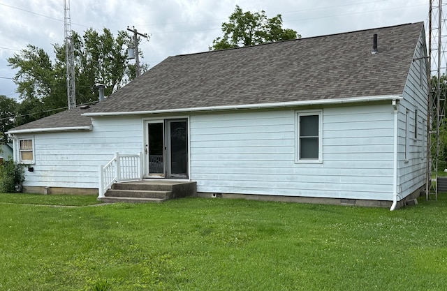 7188 Clark Dr, Russells Point, OH 43348 - rear view of house with a shingled roof, a yard, and crawl space