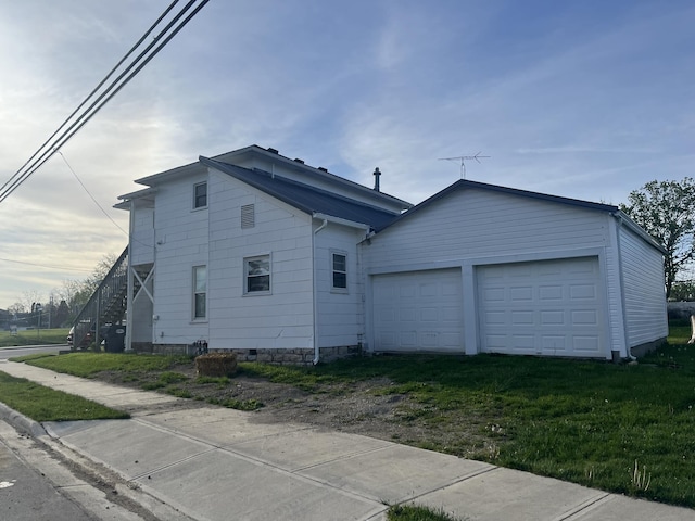 127 N Sycamore St, Union City, OH 45390 - view of side of property with a garage