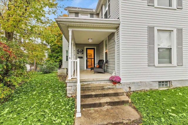 property entrance featuring a porch