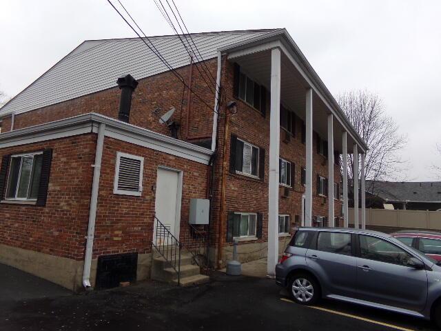 view of building exterior featuring entry steps