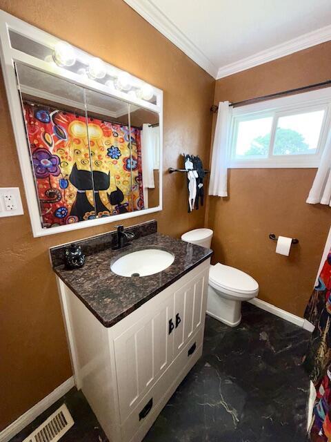 271 N Ludlow St, Covington, OH 45318 - full bath featuring ornamental molding, vanity, marble finish floors, and a shower with curtain