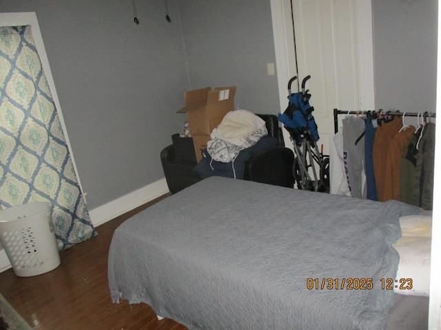 bedroom featuring dark hardwood / wood-style floors