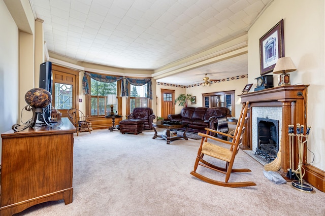 103 N Boggs St, De Graff, OH 43318 - living room featuring carpet flooring, a tile fireplace, and a ceiling fan