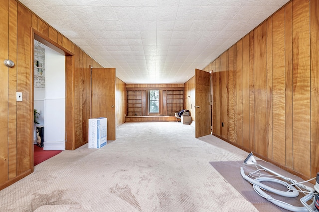 103 N Boggs St, De Graff, OH 43318 - carpeted spare room featuring wooden walls and built in shelves