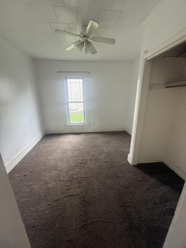 115 Vine St, Ludlow Falls, OH 45339 - unfurnished bedroom featuring carpet floors and a ceiling fan