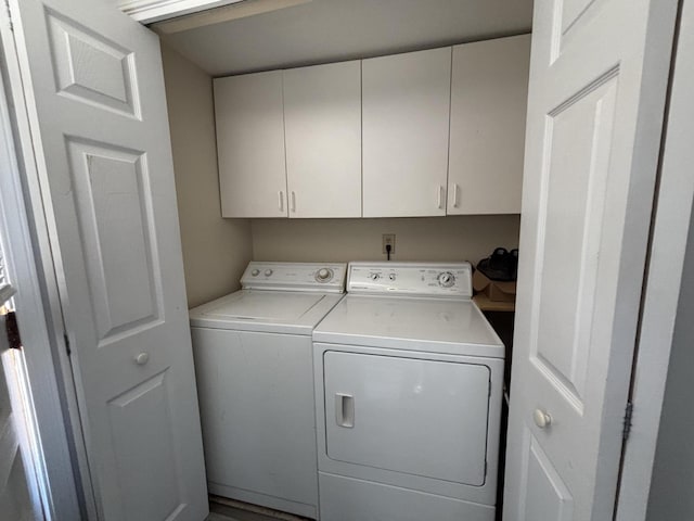7824 Maple St, Russells Point, OH 43348 - washroom featuring independent washer and dryer and cabinet space